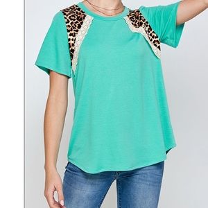 Jade top with leopard shoulder accents